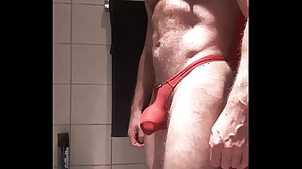 MUSLED HAIRY IN RED THONG
