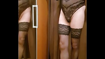 Crossdresser posing in a lingerie body.
